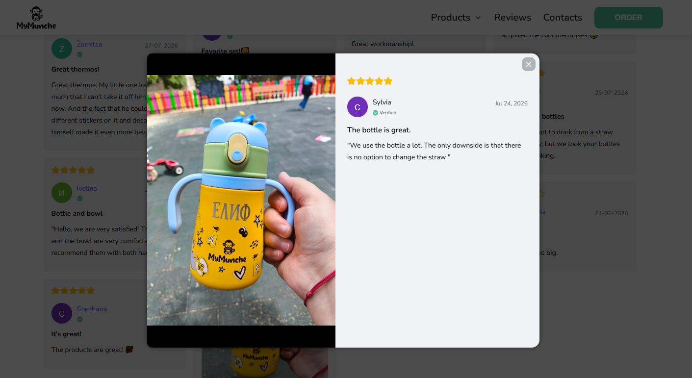 MyMunche photo review showing a personalised kids water bottle held outdoors