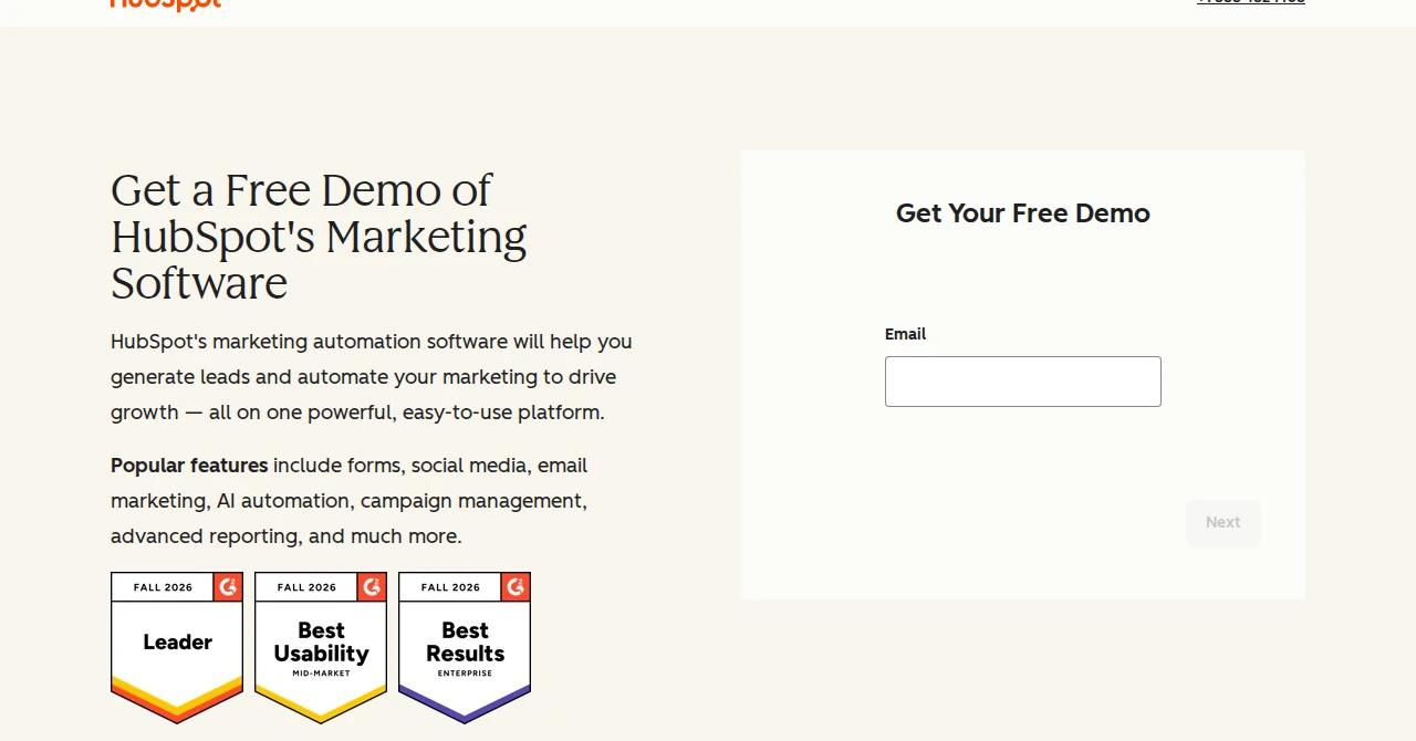 HubSpot demo page with an email-only first step beside the headline, above the fold